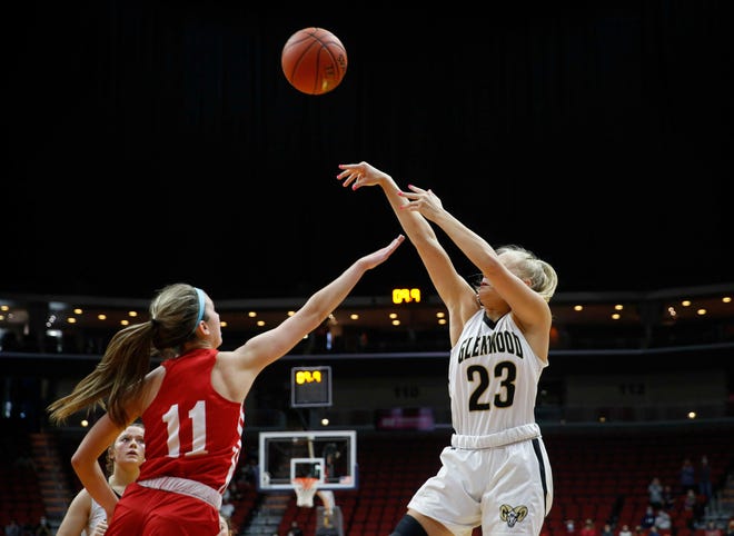 Ballard junior guard Brooke Loewe applies aggressive defense as Glenwood senior Elle Scarborough fires a last-second field goal attempt on Saturday, March 6, 2021, during the Iowa high school girls state basketball tournament Class 4A finals at Wells Fargo Arena in Des Moines.