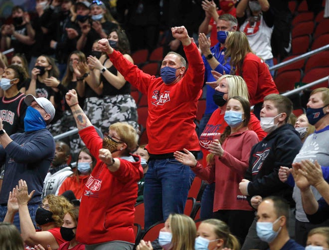 Ballard fans cheer as the Bombers increase their lead on Glenwood in the second quarter on Saturday, March 6, 2021, during the Iowa high school girls state basketball tournament Class 4A finals at Wells Fargo Arena in Des Moines.
