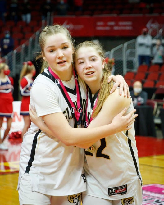 Members of the Glenwood girls basketball team console each other after the Rams lost to Ballard on Saturday, March 6, 2021, during the Iowa high school girls state basketball tournament Class 4A finals at Wells Fargo Arena in Des Moines.